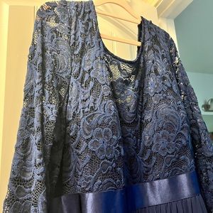 Mother of the bride or groom.                    Blue lace, fully lined.